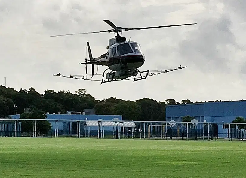 florida keys mosquito control lands helicopter